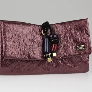 Louis Vuitton Metallic Plum Clutch with Decorative Tassel